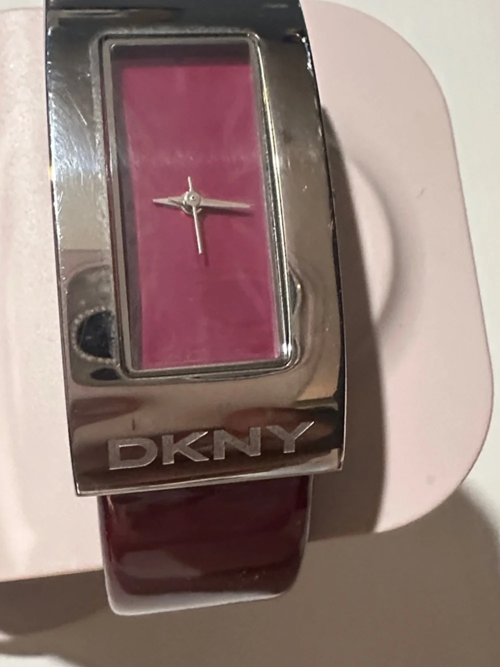 Women’s elegant DKNY Magenta Dial Silver-Tone Bangle Watch